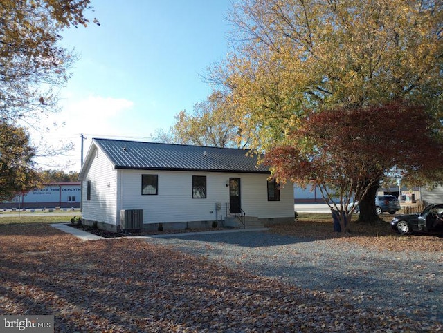 back of property with central AC unit