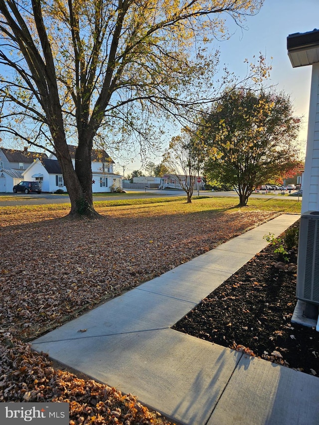 view of yard featuring central AC