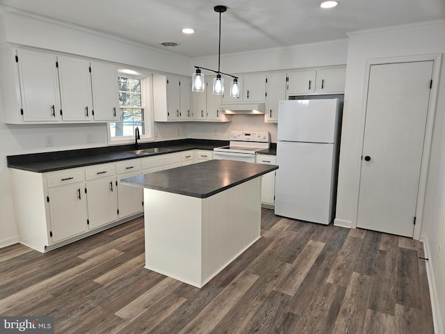 kitchen featuring white cabinetry, a center island, white appliances, and dark hardwood / wood-style floors