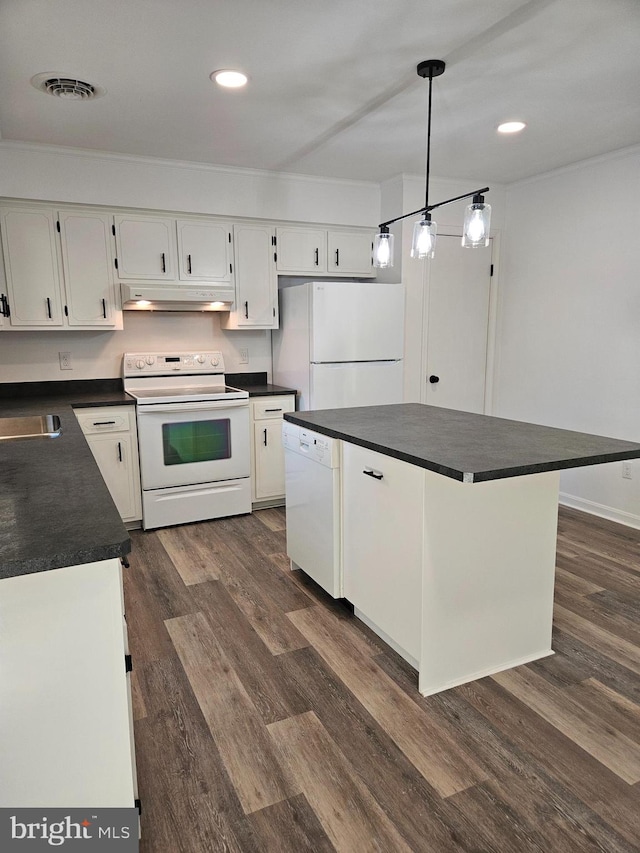 kitchen featuring a kitchen island, white cabinetry, decorative light fixtures, dark hardwood / wood-style floors, and white appliances