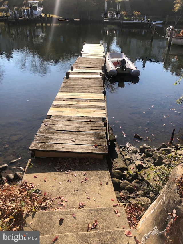 view of dock featuring a water view