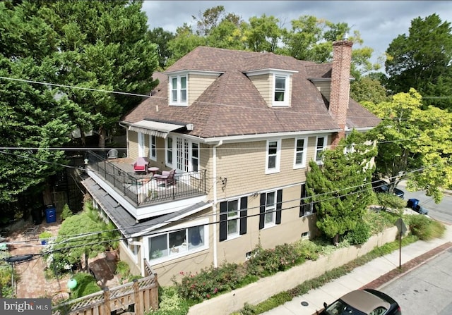 back of house featuring french doors