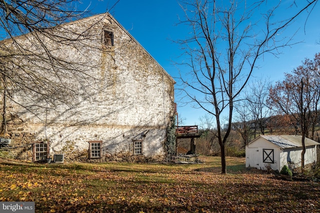view of home's exterior featuring a lawn