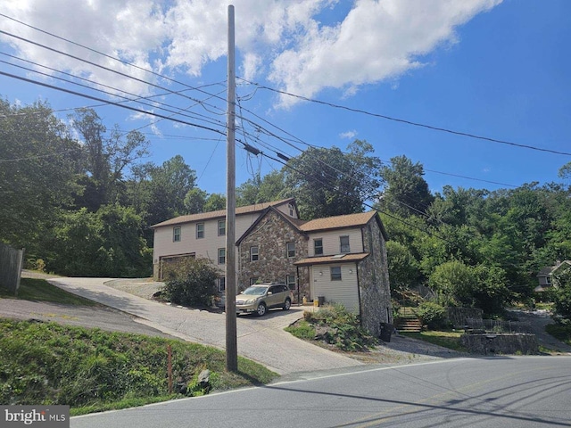 view of front of property with a garage