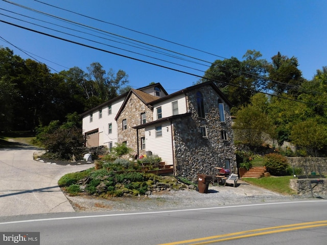 view of front of home with a garage