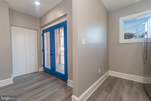 entryway featuring french doors and hardwood / wood-style floors