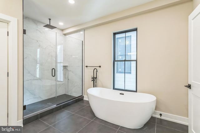 bathroom featuring tile patterned floors and plus walk in shower