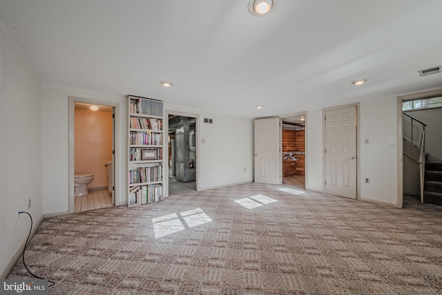 interior space with light colored carpet