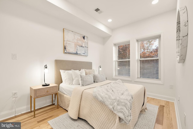 bedroom featuring hardwood / wood-style flooring