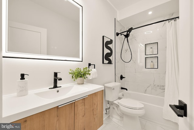 full bathroom with vanity, toilet, and shower / tub combo