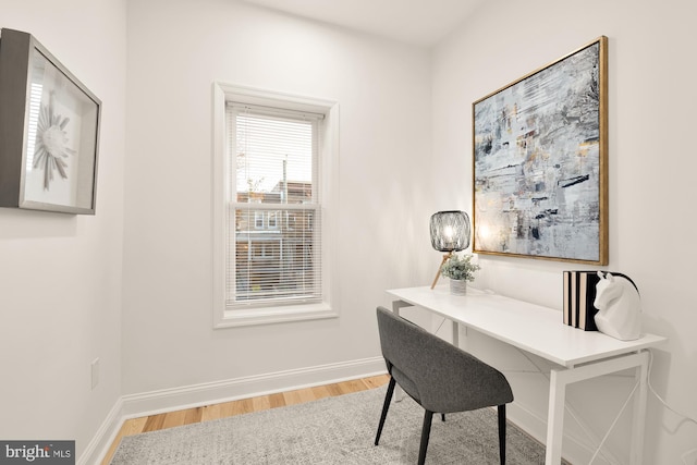 office area with hardwood / wood-style flooring