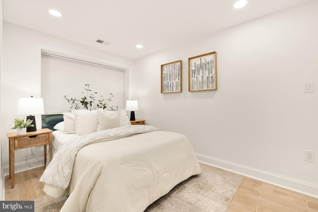 bedroom featuring wood-type flooring