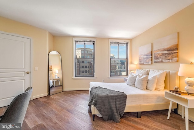 bedroom with wood-type flooring