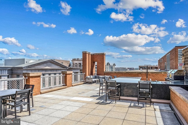 view of patio featuring a grill