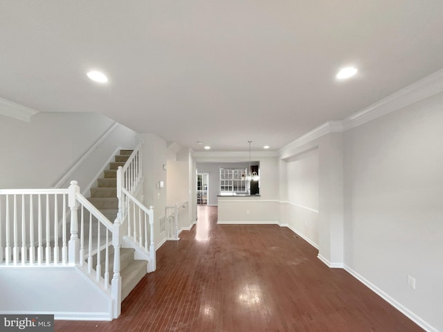 interior space featuring dark hardwood / wood-style flooring and crown molding