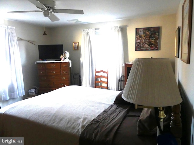 bedroom featuring ceiling fan