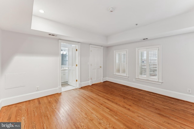 unfurnished room featuring light hardwood / wood-style floors