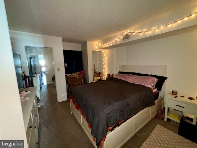 bedroom featuring visible vents