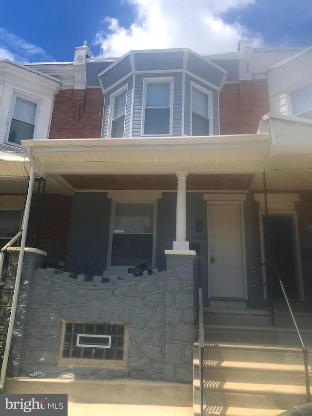 view of front facade featuring covered porch