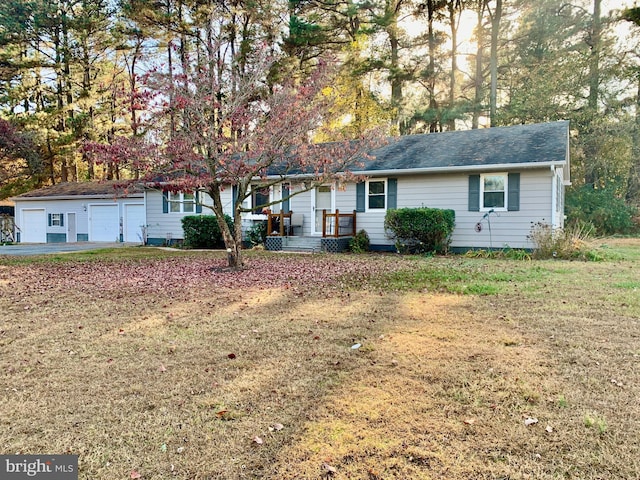 ranch-style home with a front lawn