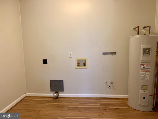 laundry area featuring hookup for an electric dryer, water heater, hookup for a gas dryer, hookup for a washing machine, and hardwood / wood-style flooring