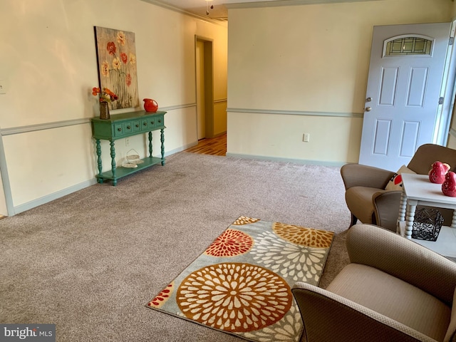 living room featuring carpet floors and crown molding