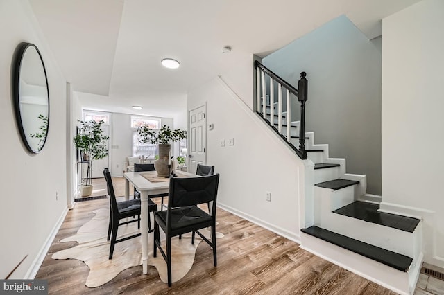 dining room with light hardwood / wood-style floors