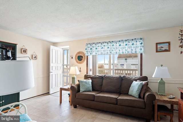 20 Amber St Unit E3, Beach Haven, NJ 08008 - living area featuring a textured ceiling
