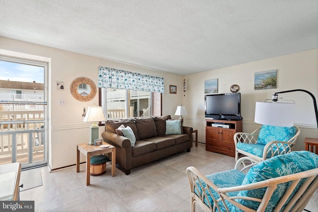 20 Amber St Unit E3, Beach Haven, NJ 08008 - living area featuring a textured ceiling