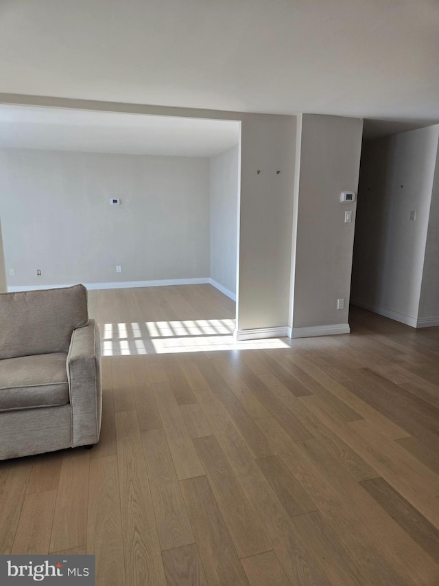 unfurnished room featuring light hardwood / wood-style floors