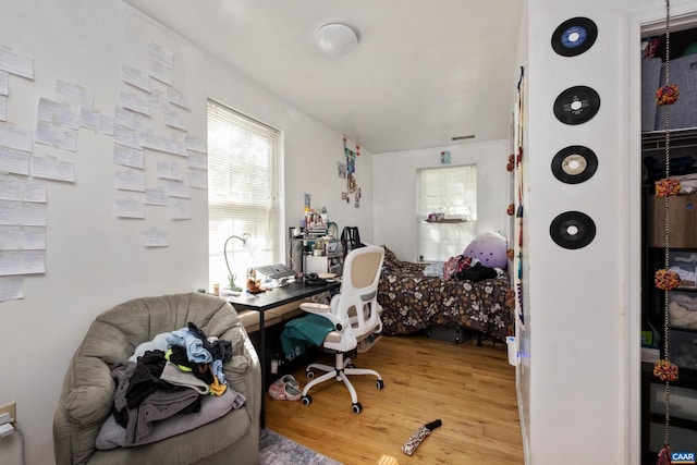 office with hardwood / wood-style flooring