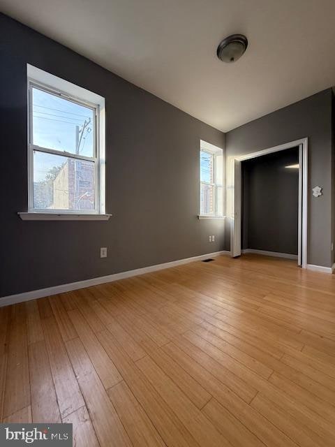 unfurnished bedroom with light hardwood / wood-style floors