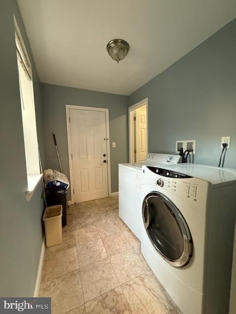 washroom with washer and clothes dryer