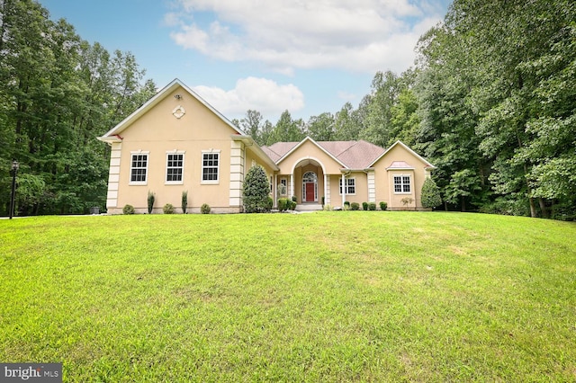 ranch-style house with a front yard