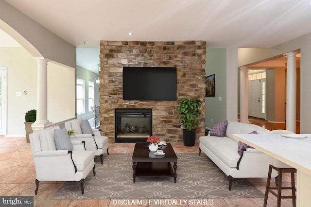 living room featuring a fireplace