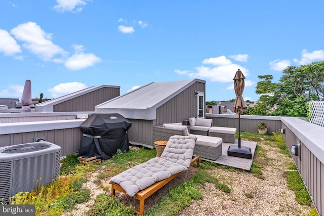 view of yard with central AC unit and outdoor lounge area