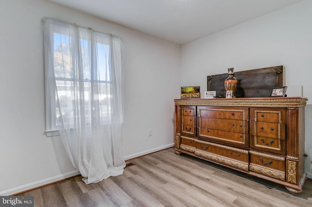 bedroom featuring light wood-type flooring