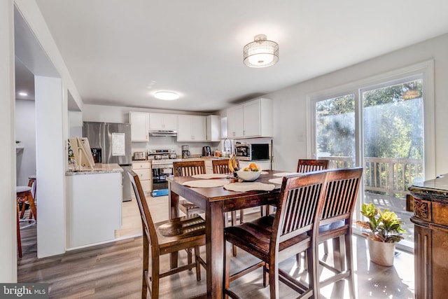 dining area featuring light hardwood / wood-style flooring