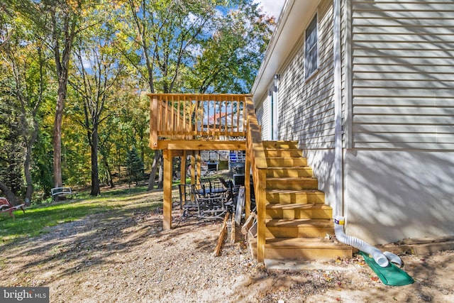 exterior space featuring a wooden deck