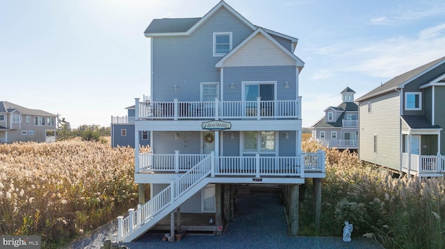 back of house with a balcony