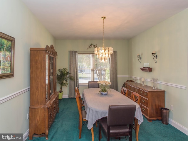 dining room with an inviting chandelier and dark colored carpet