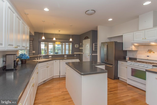 kitchen featuring white cabinets, white appliances, and light wood-type flooring