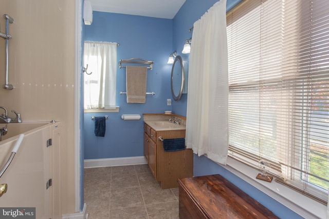 bathroom featuring vanity and tile patterned flooring