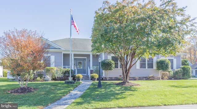 view of front facade with a porch and a front lawn