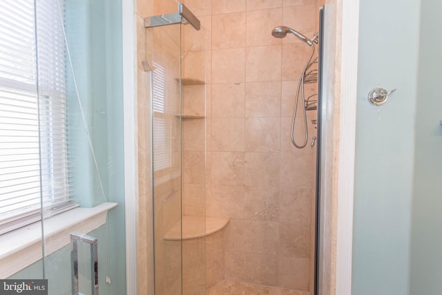 bathroom with an enclosed shower