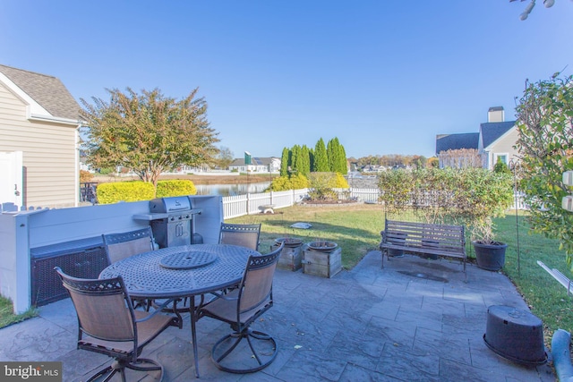 view of patio with a grill