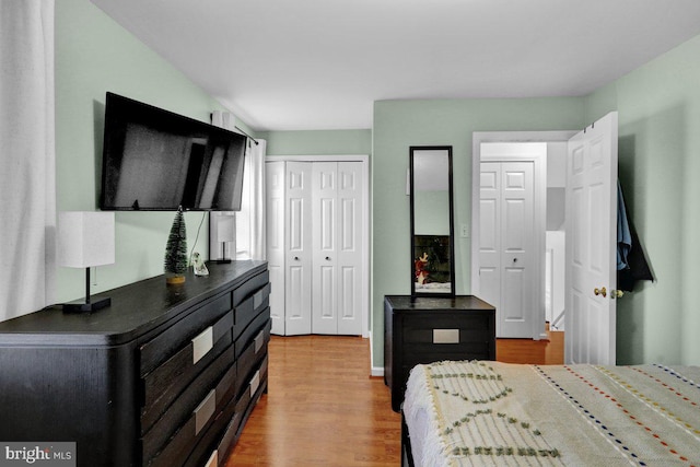 bedroom featuring hardwood / wood-style floors