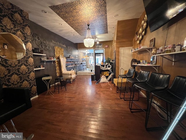 interior space featuring a chandelier and hardwood / wood-style floors