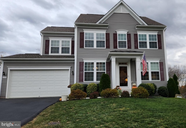 view of front of home with a front lawn