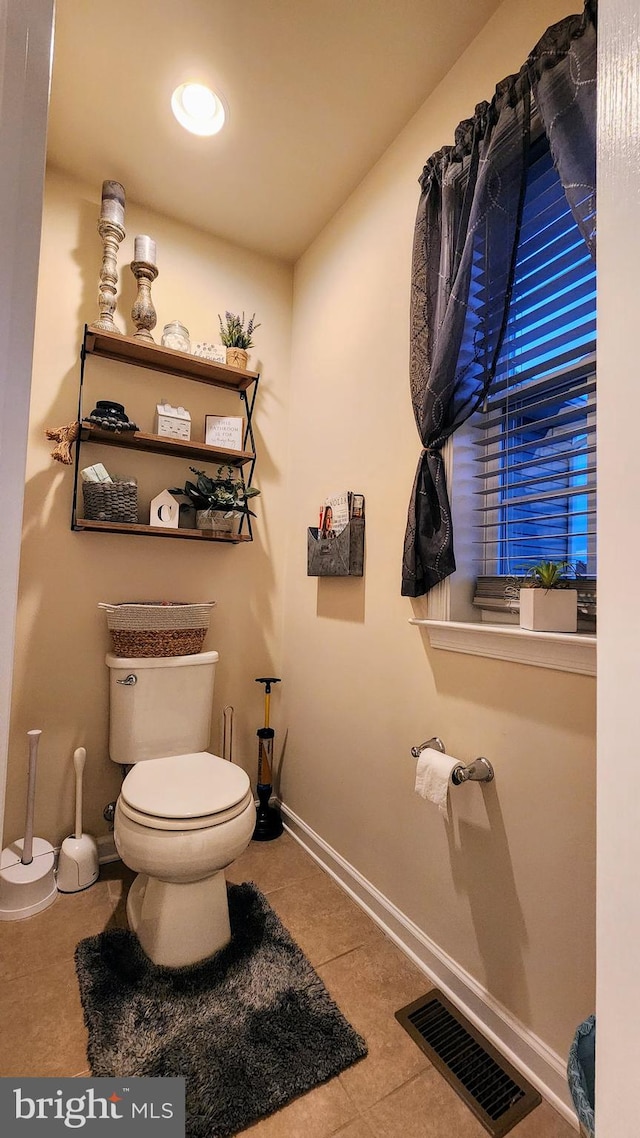 bathroom featuring toilet